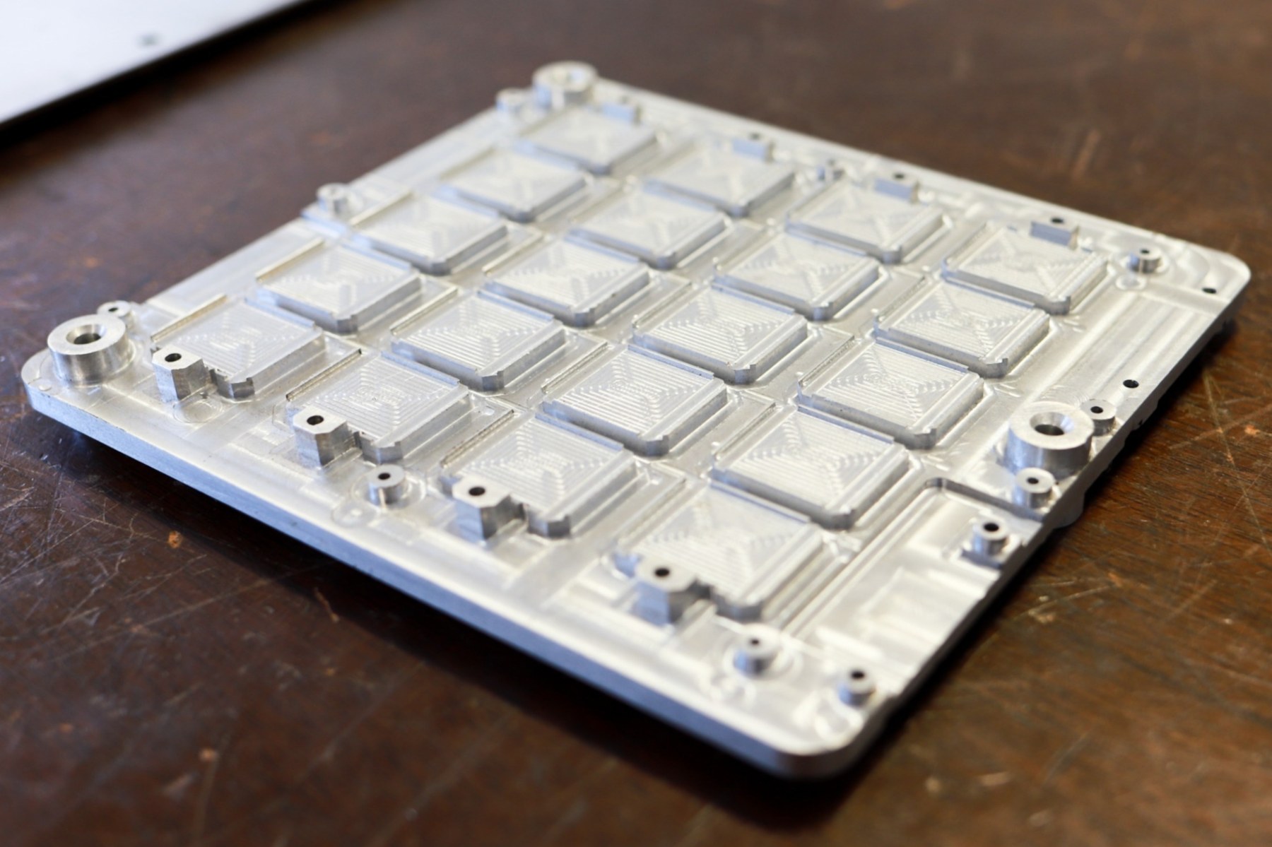 Machined aluminum tray plate produced by Blue Ridge Tool