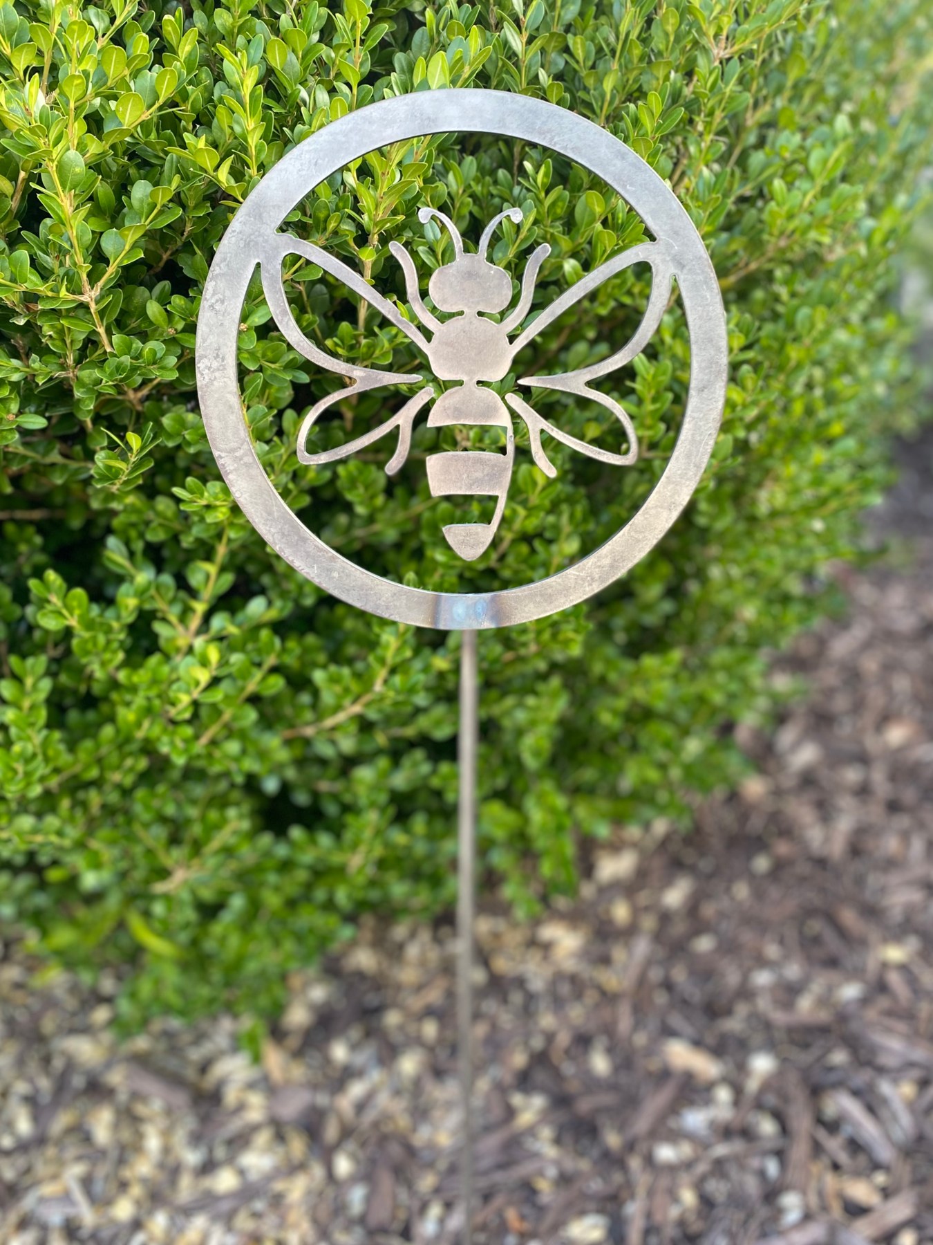 Steel bee garden stake cut by Blue Ridge Tool